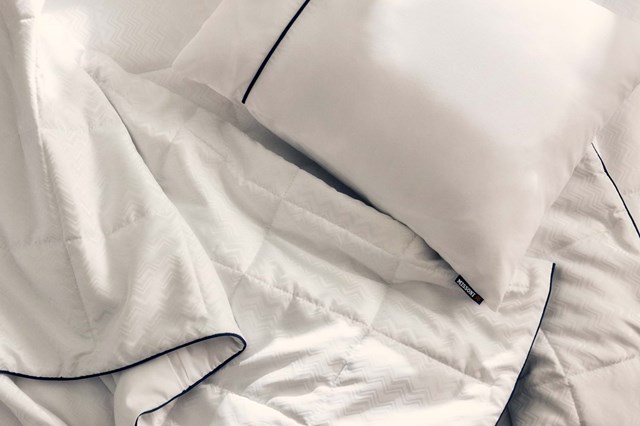 Conjunto de roupas de cama.