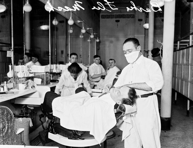 Uma barbearia a funcionar em Chicago, em 1918