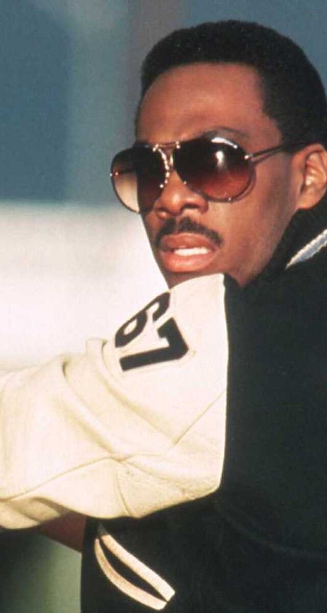 Eddie Murphy como Axel Foley em O Caça Policias II (1987).