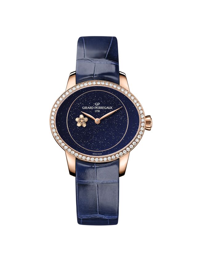 Girard Perregaux Cat's Eye Plum Blossom, caixa elíptica olho-de-gato e movimento automático GP03300-0149/0150 com reserva de marcha de 46 horas.