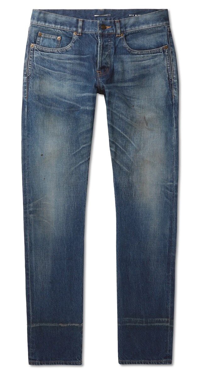 Calças em denim, € 650, Saint Laurent.