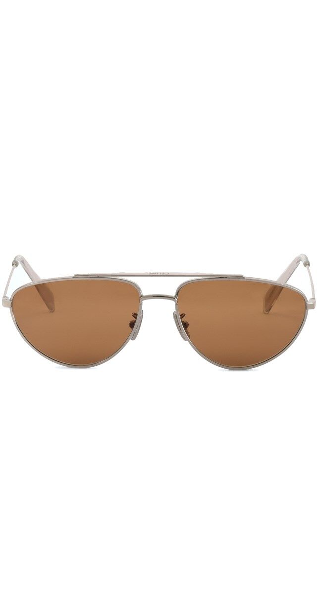 Geométricos – Óculos de sol com armação em metal, € 290, Celine.