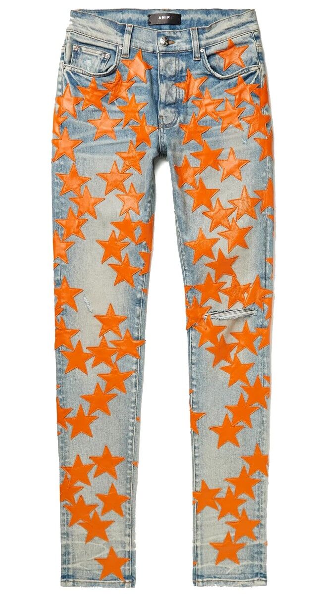 Calças em ganga com aplicações em pele, €1990, Amiri