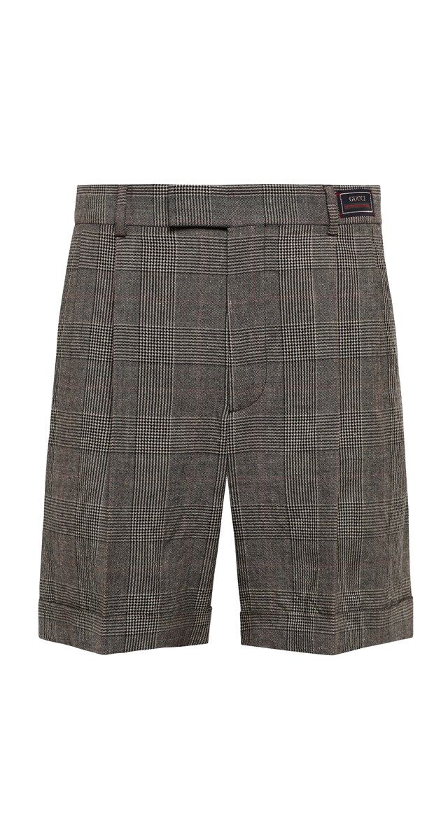 Calções em linho e lã, € 790, Gucci