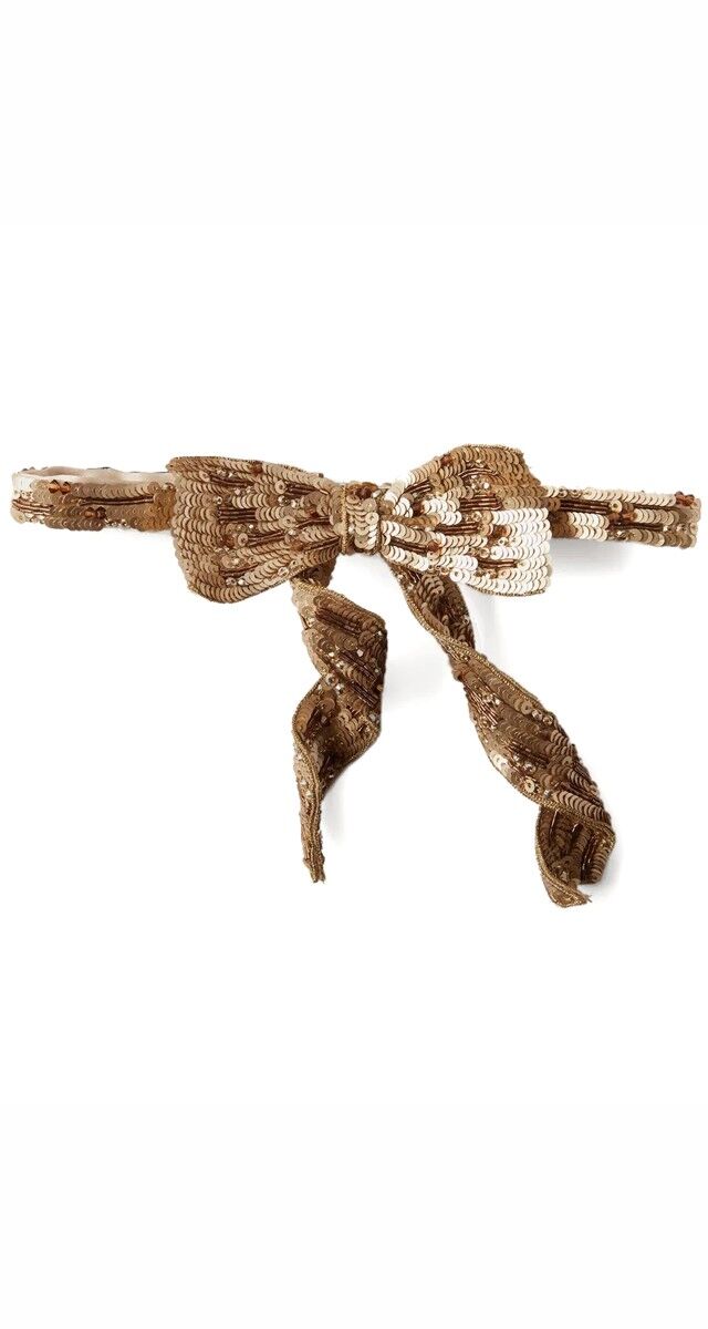 Laço em seda revestida a lantejoulas, €595, Saint Laurent.