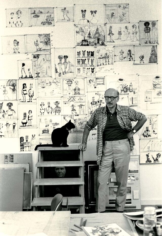 Saul Steinberg com um gato.