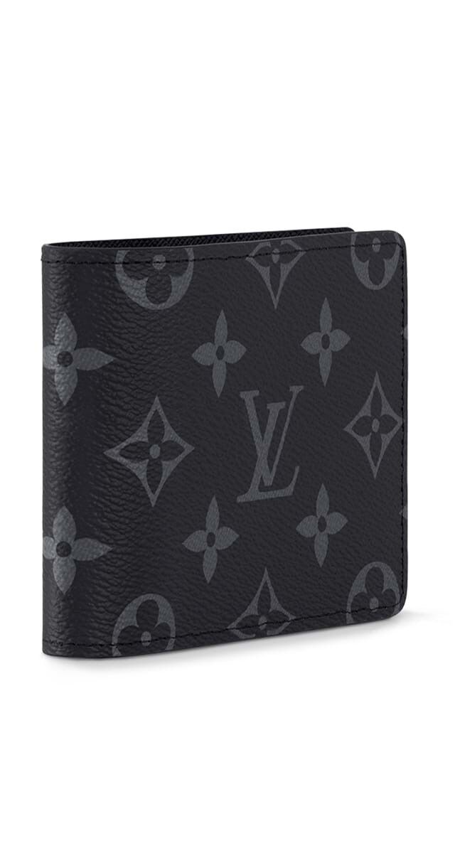 Carteira porta-cartões Slender em tela Monogram Eclipse, €380, Louis Vuitton.