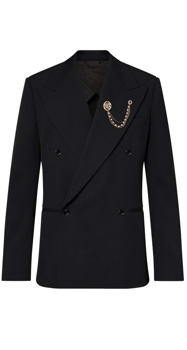 Blazer trespassado em lã, €3500, Louis Vuitton.