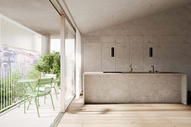 A cozinha e a sala constituem um área loft com luz natural em ambas as frentes
