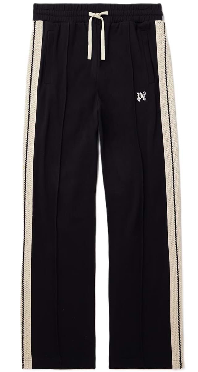 Calças em malha piquet de algodão com aplicação de crochet, €795, Palm Angels.