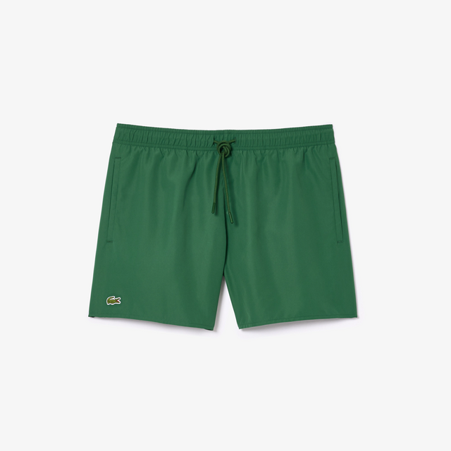 Calções, €80, Lacoste